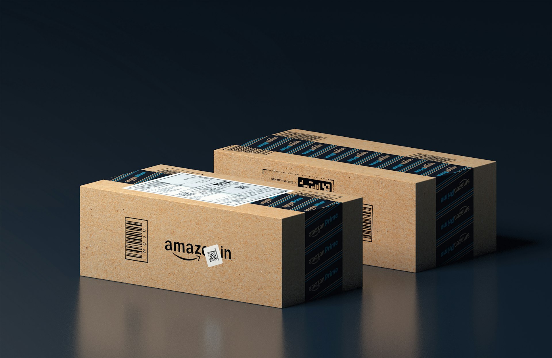 Two cardboard shipping boxes with branded tape on a dark blue surface