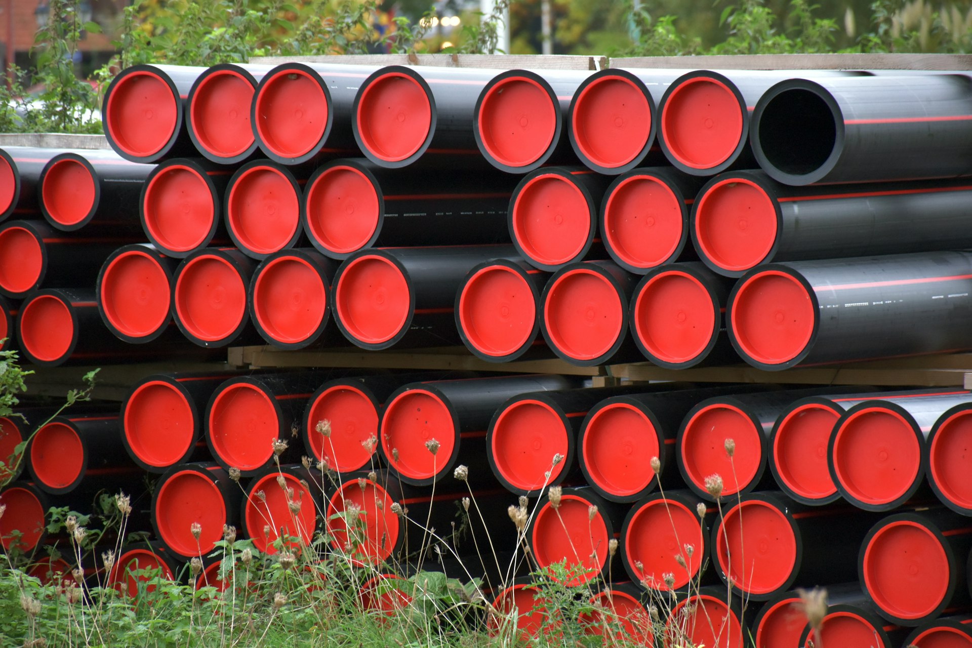 A pile of pipes sitting next to each other